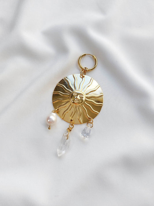 APOTHEOSIS single-loop medallion sun