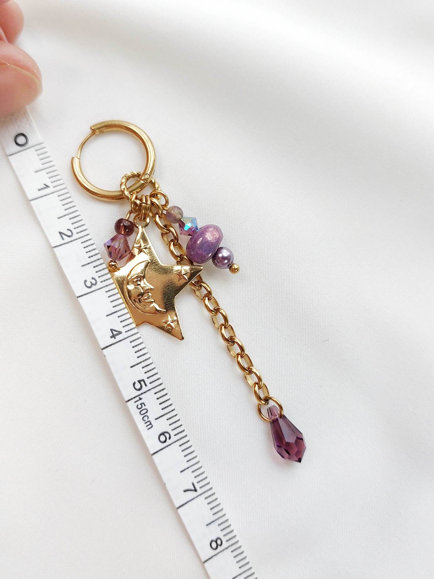 CELESTE single violet and gold star earring