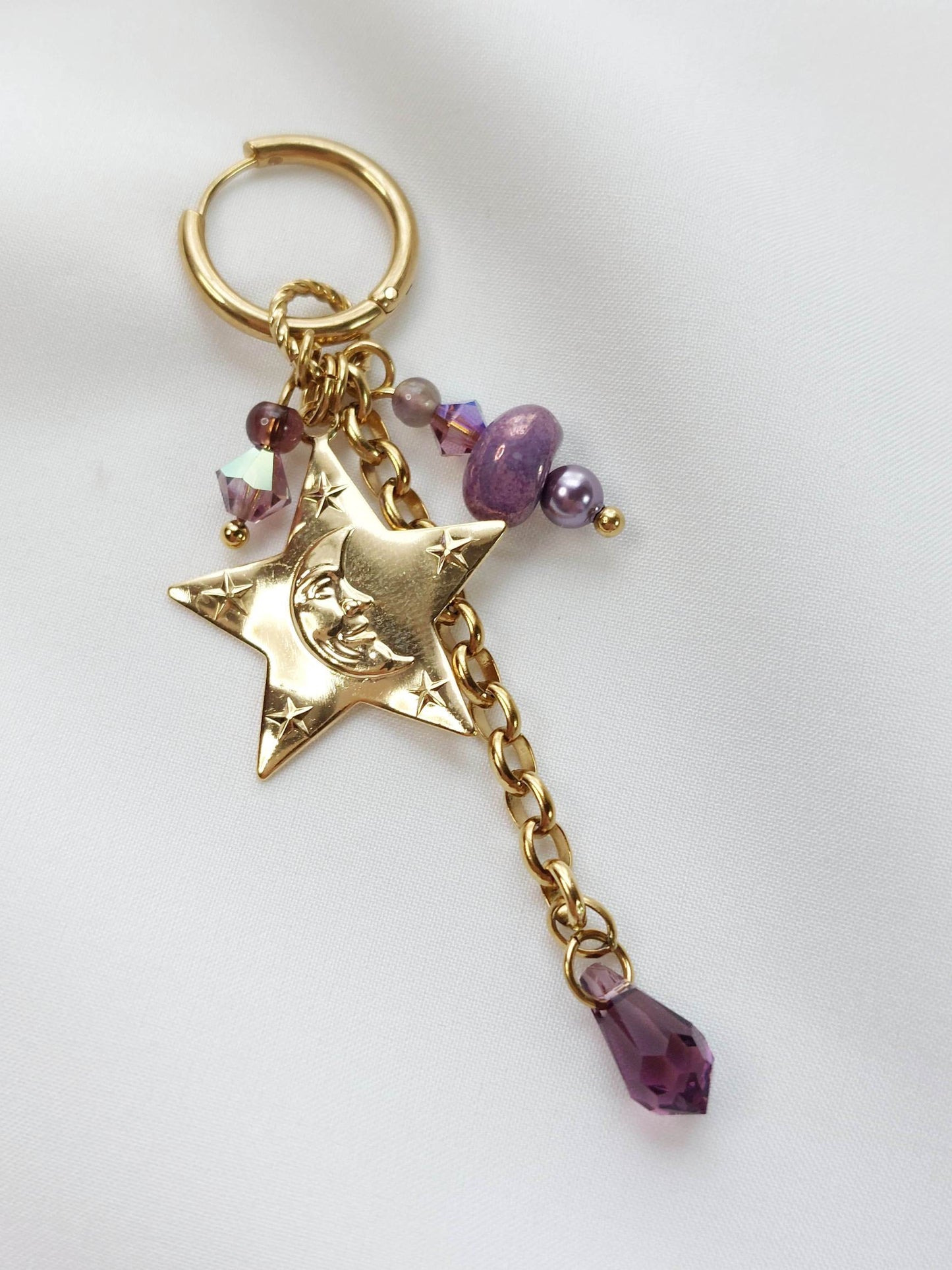 CELESTE single violet and gold star earring