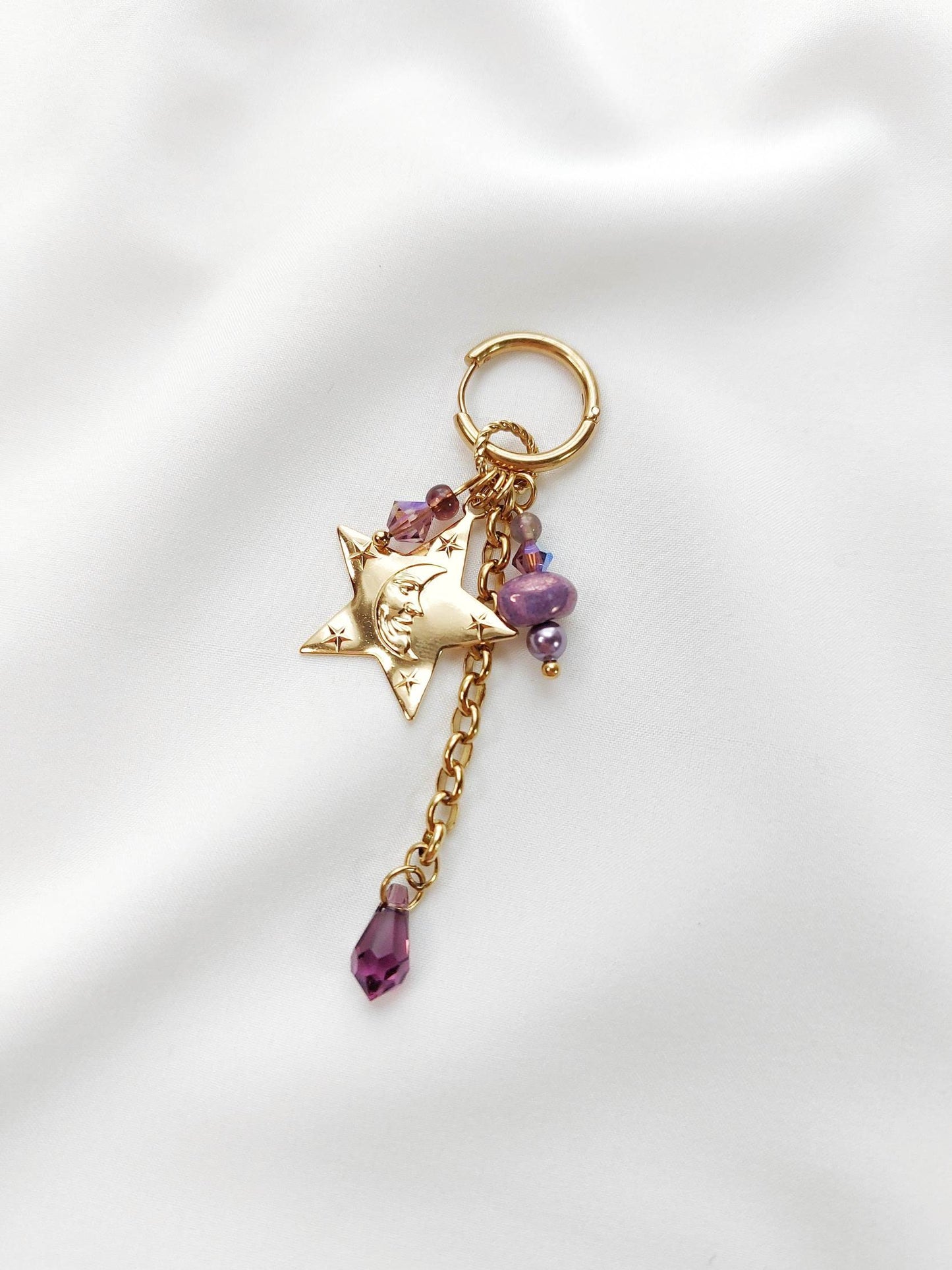 CELESTE single violet and gold star earring