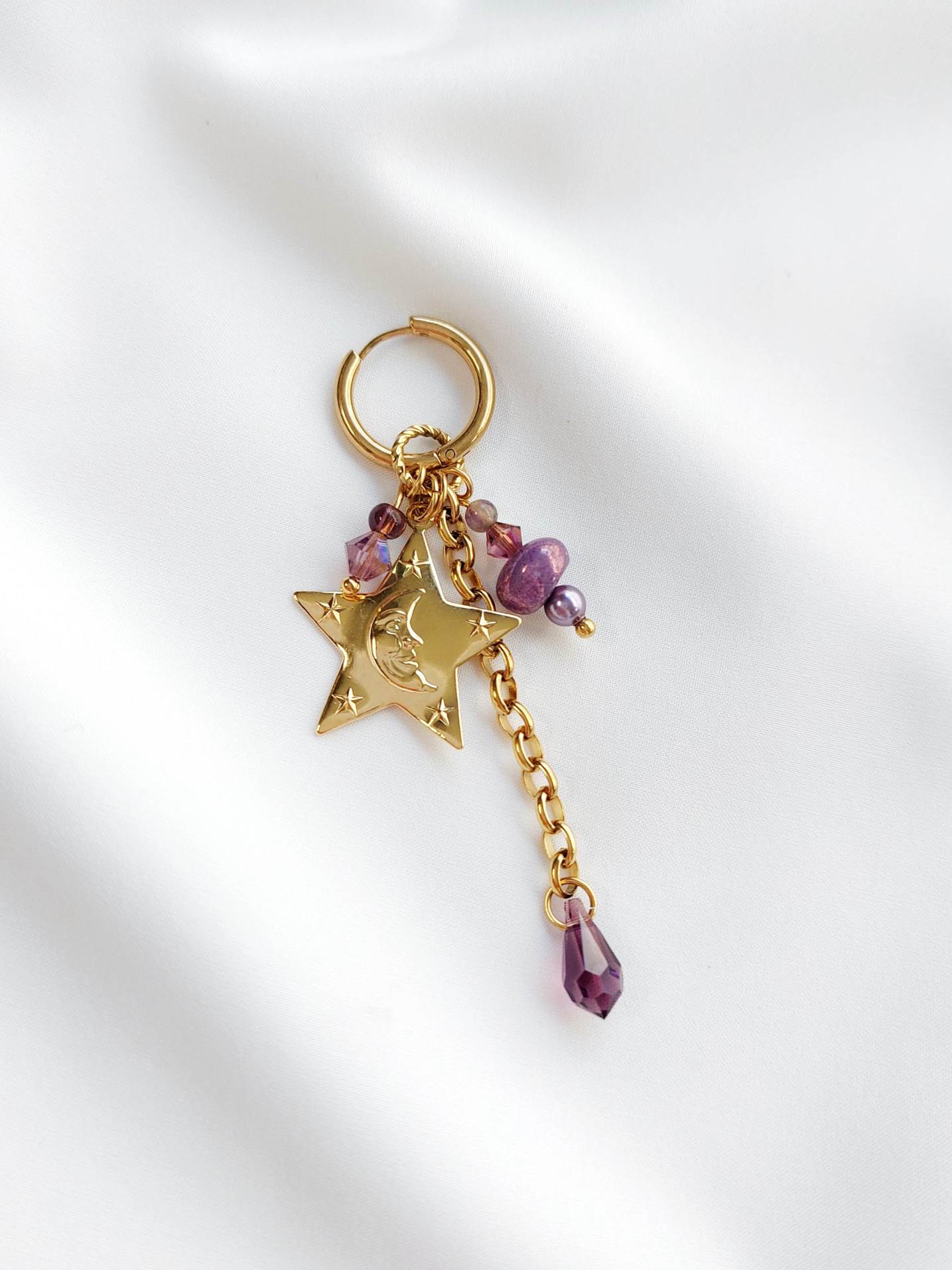 CELESTE single violet and gold star earring