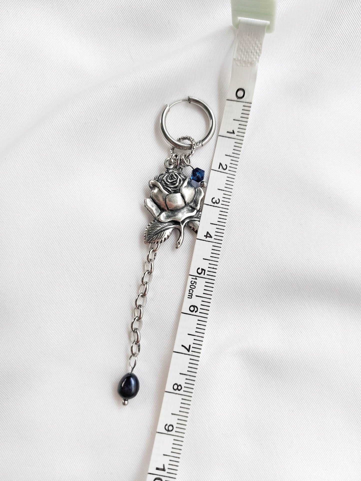 PROHIBITED silver-plated and blue rose single-loop