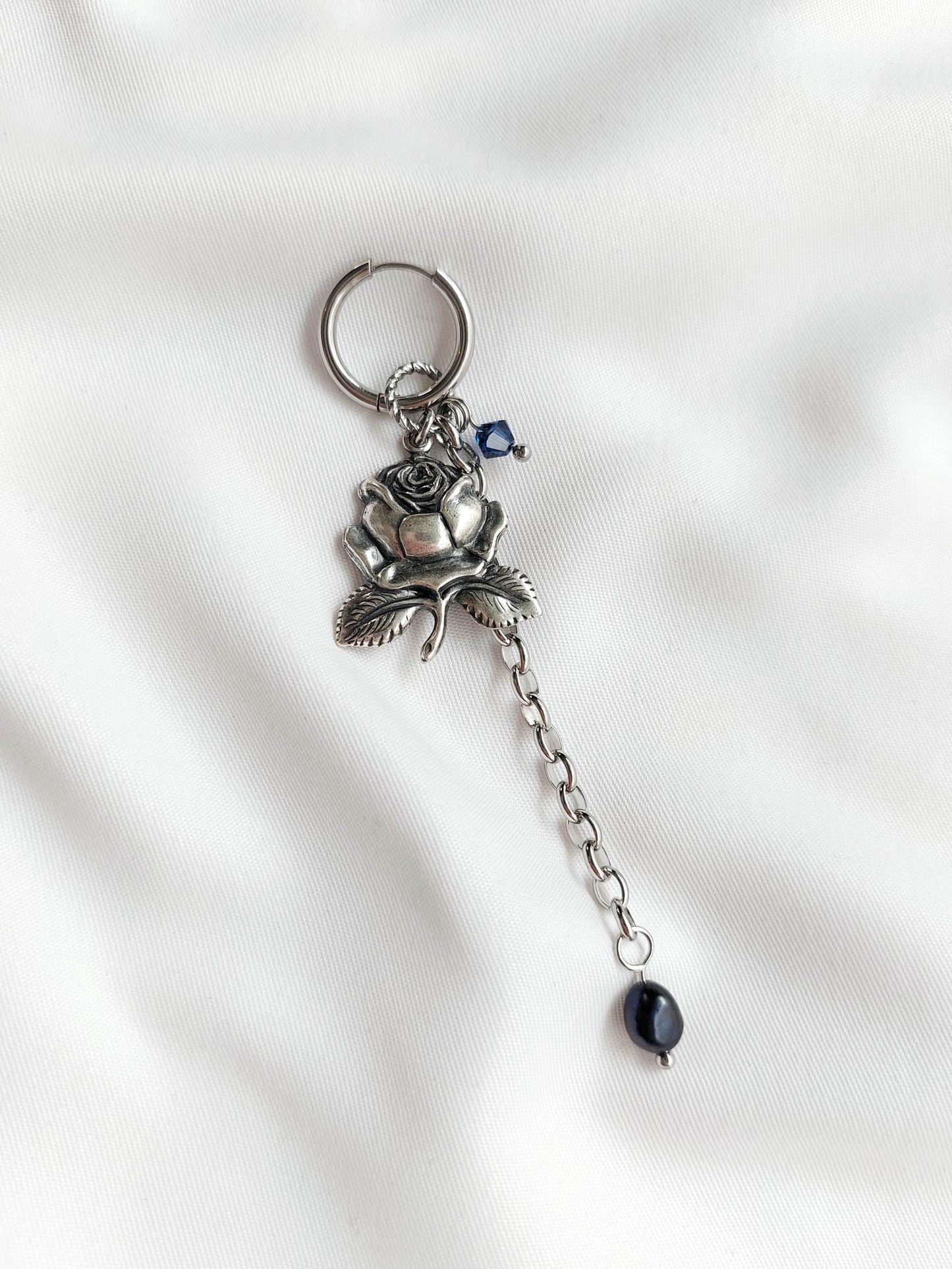 PROHIBITED silver-plated and blue rose single-loop