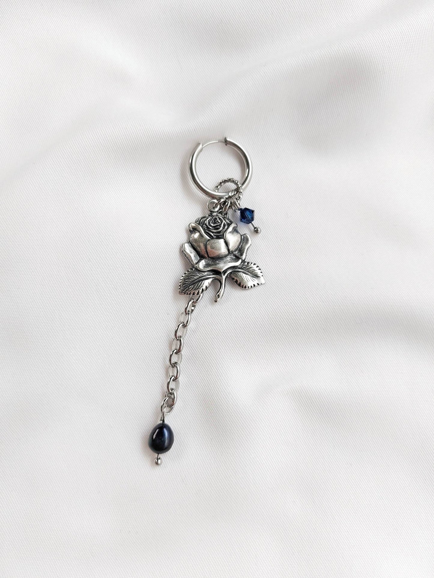 PROHIBITED silver-plated and blue rose single-loop
