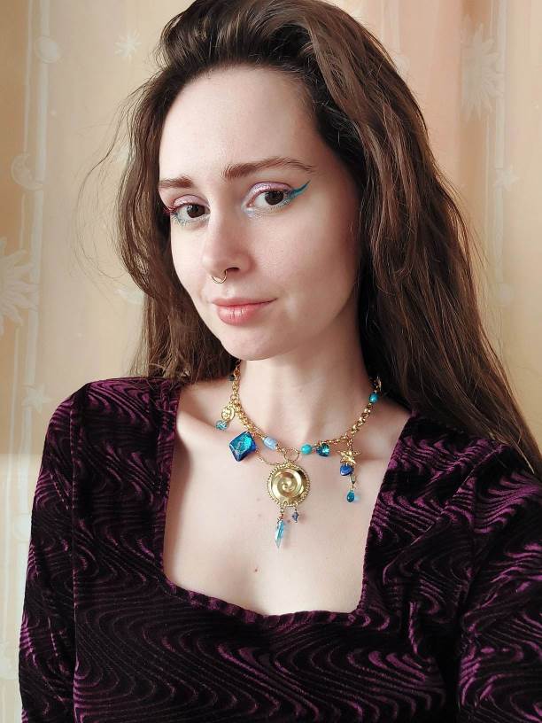 LA GALAXIA asymmetric gold and blue necklace