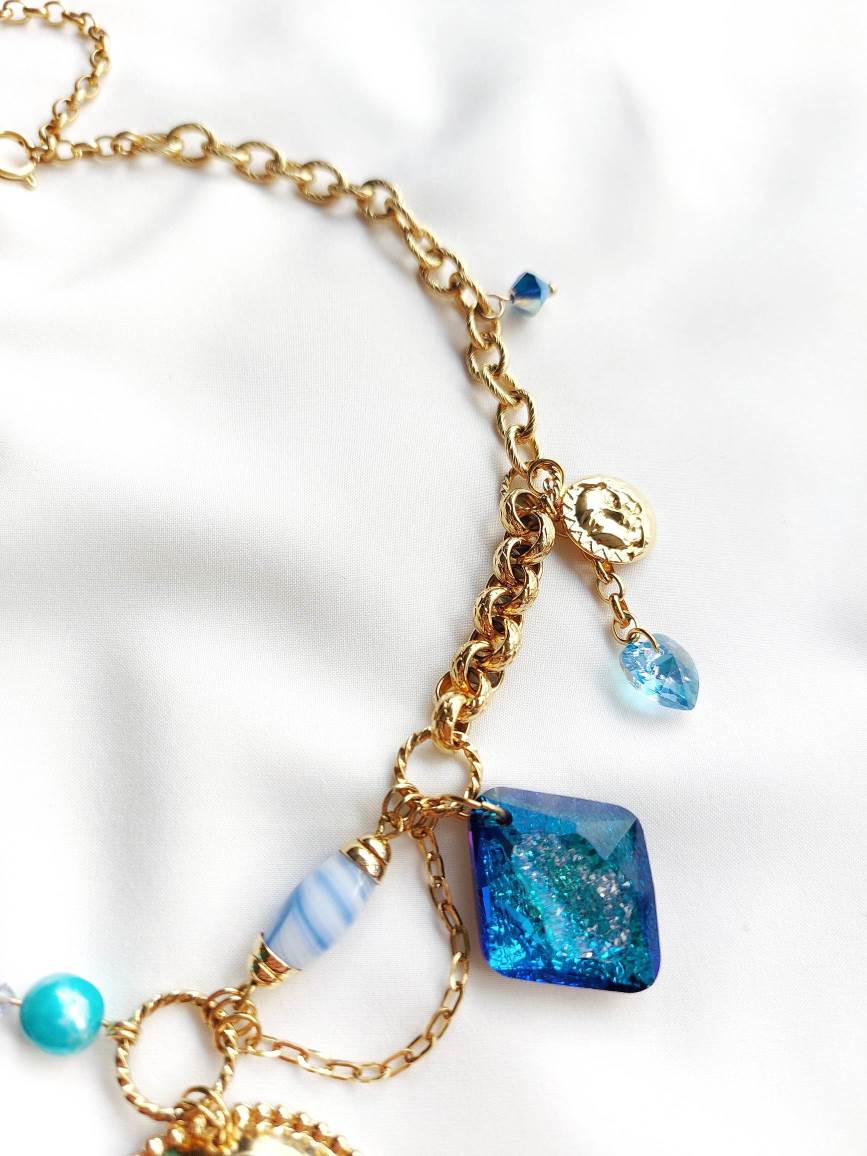 LA GALAXIA asymmetric gold and blue necklace