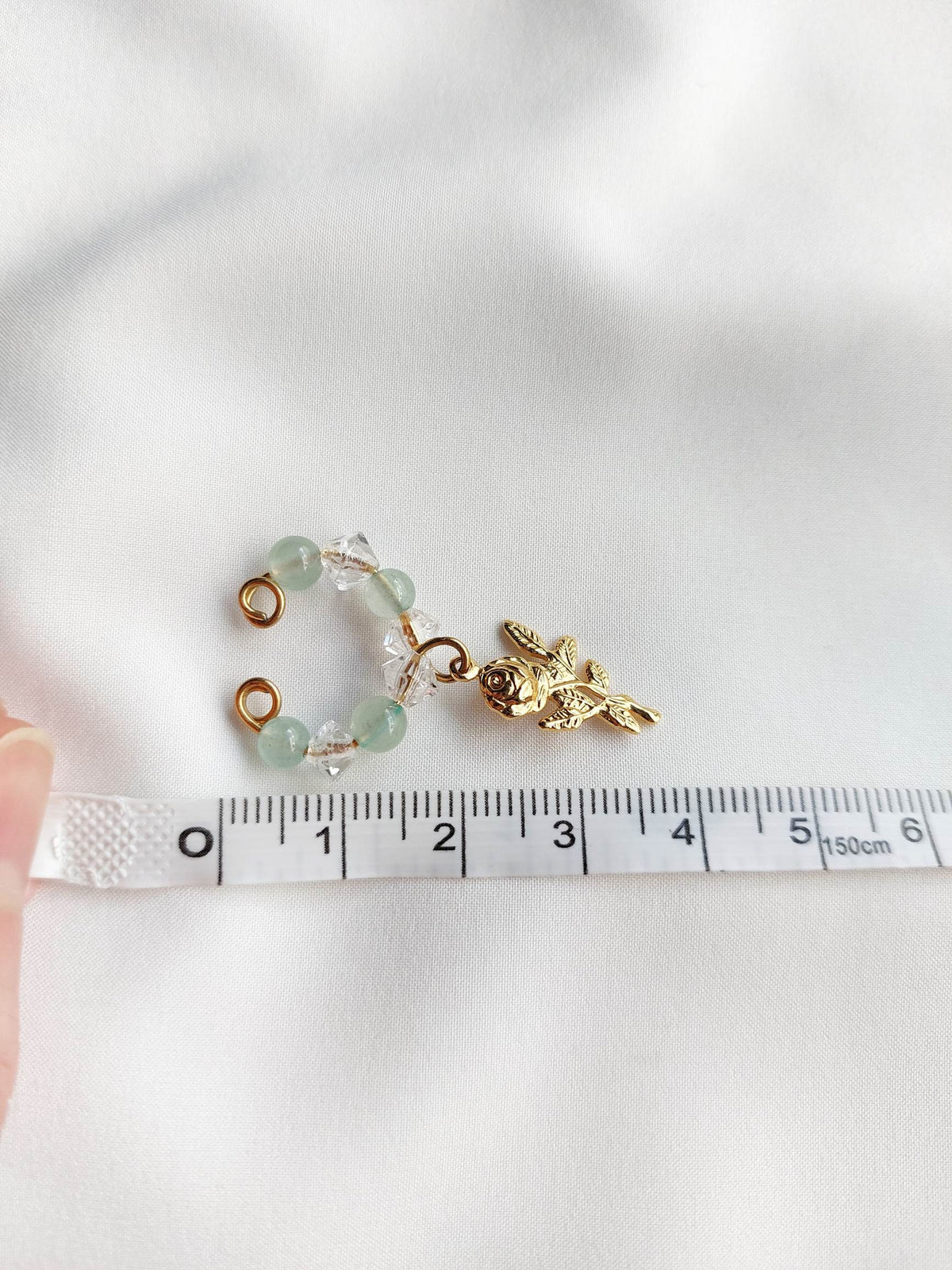 PROMESSE earcuff vert avec rose
