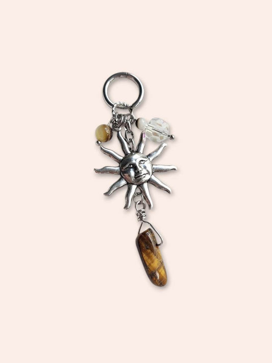 REINCARNATION single loop silver and brown sun