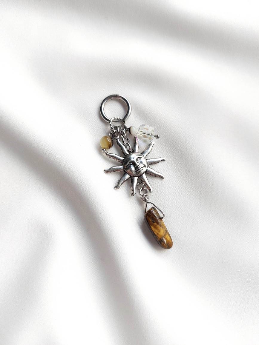 REINCARNATION single loop silver and brown sun