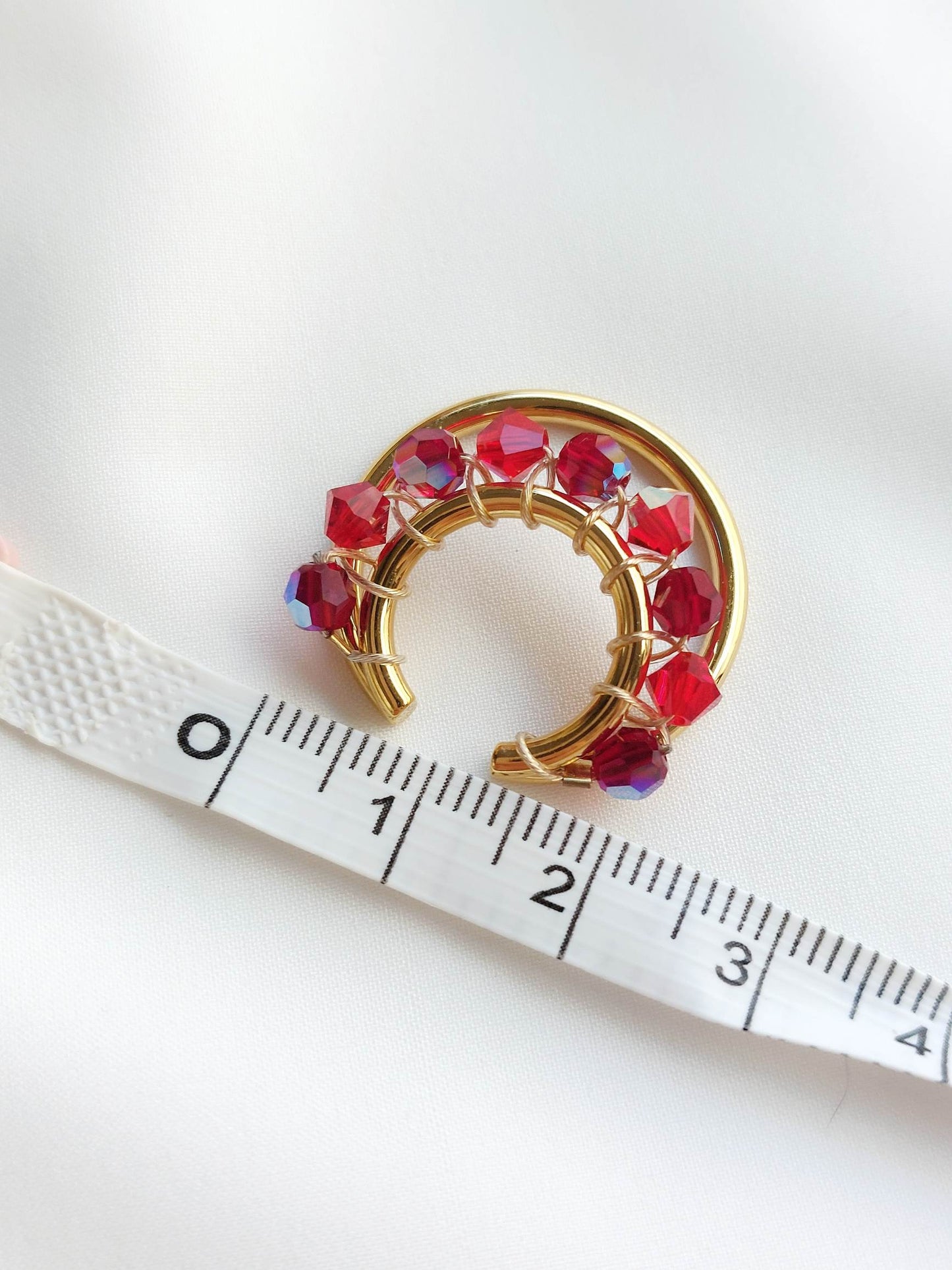GRENADE gold and red earcuff