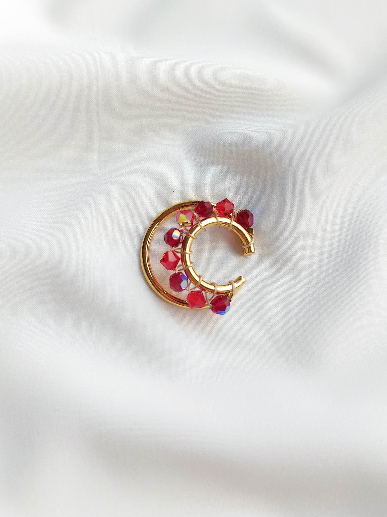 GRENADE gold and red earcuff