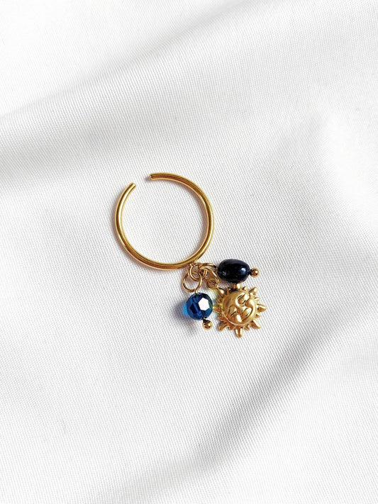 RADIANCE gold ring with midnight blue sun
