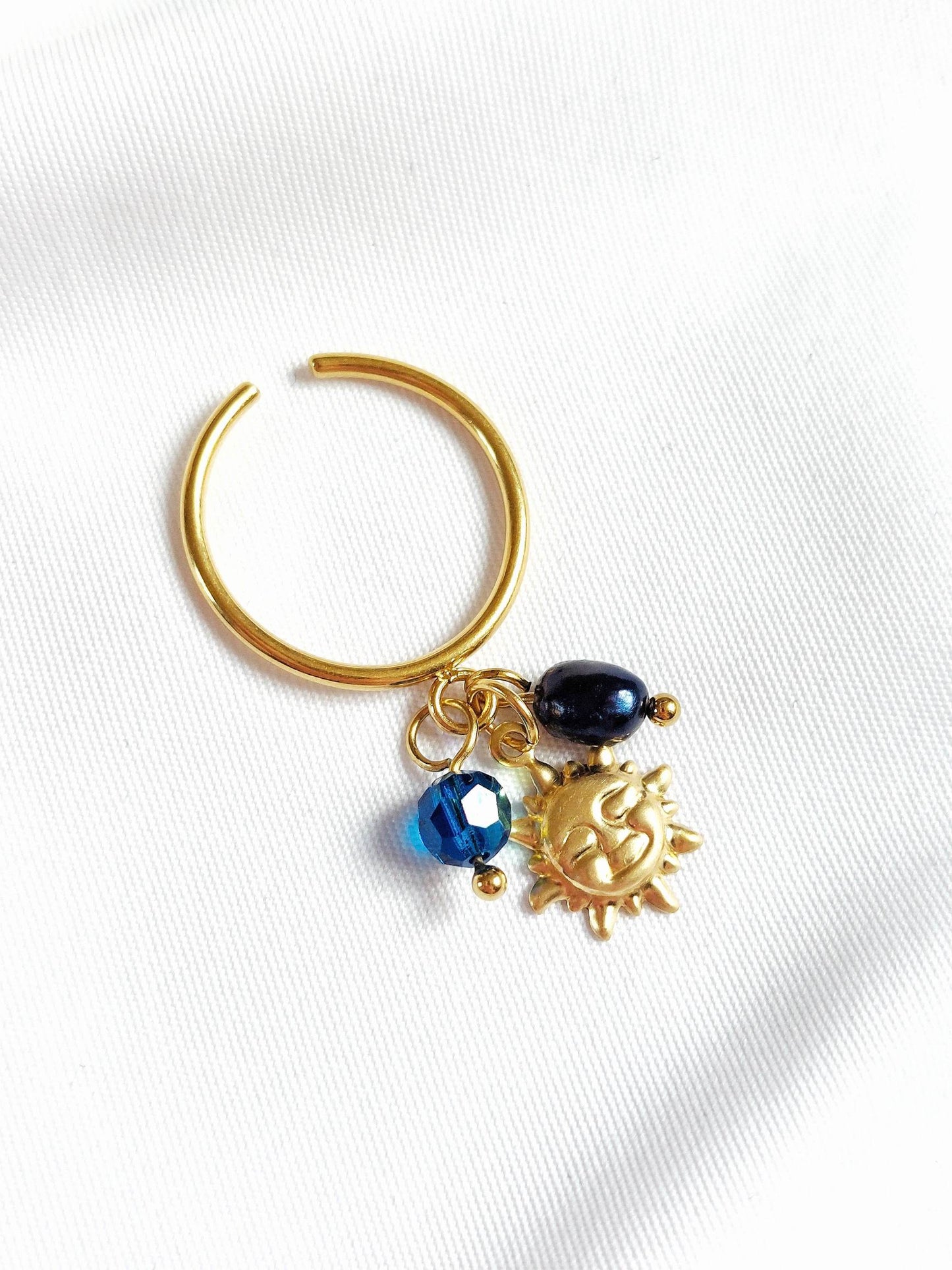 RADIANCE gold ring with midnight blue sun