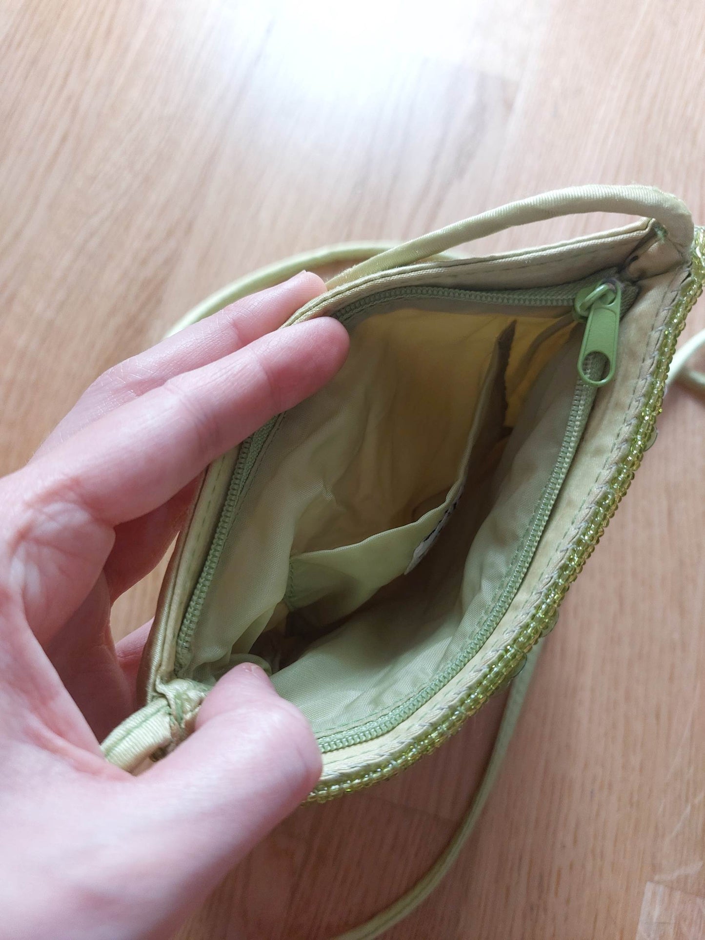 PRAIRIE green and white pouch bag with sequins