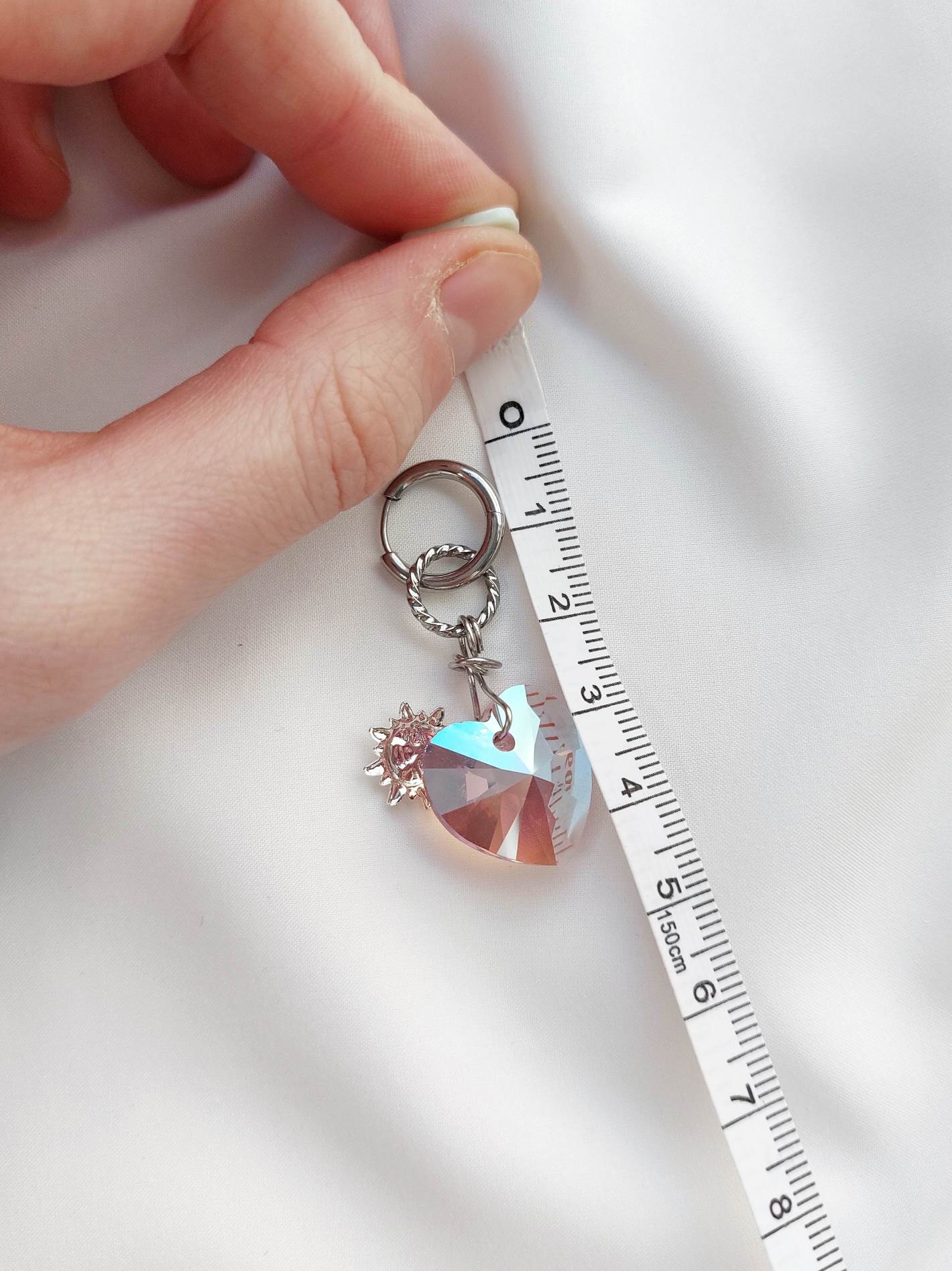 SILENCE single-loop heart and sun crystal