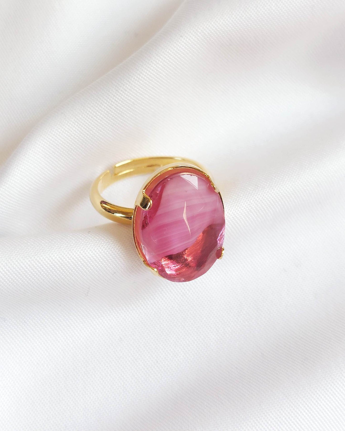 Adjustable gold ring with pink cabochon